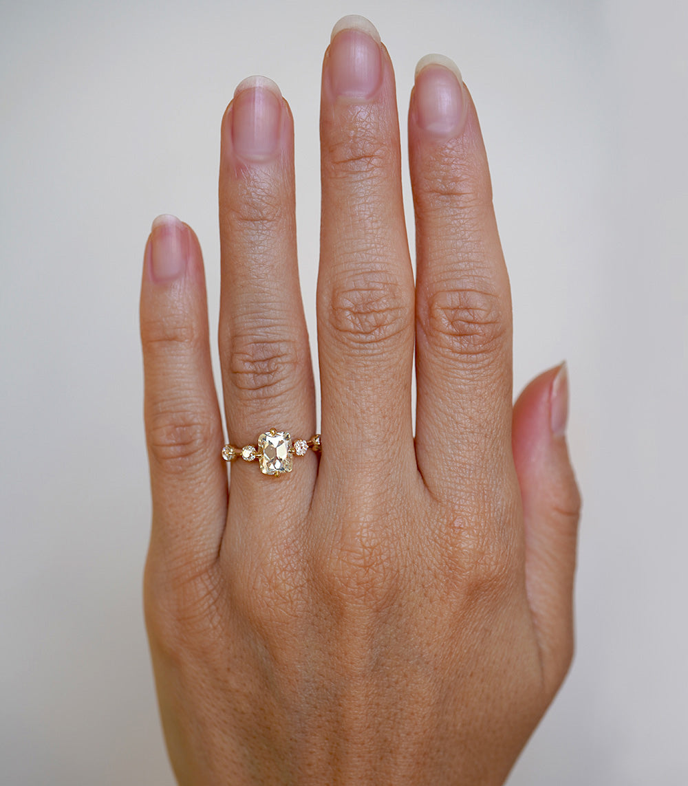 Estée SK-R112-ND-OMC-CD-1.82 3 stone engagement ring in gold with central round diamond