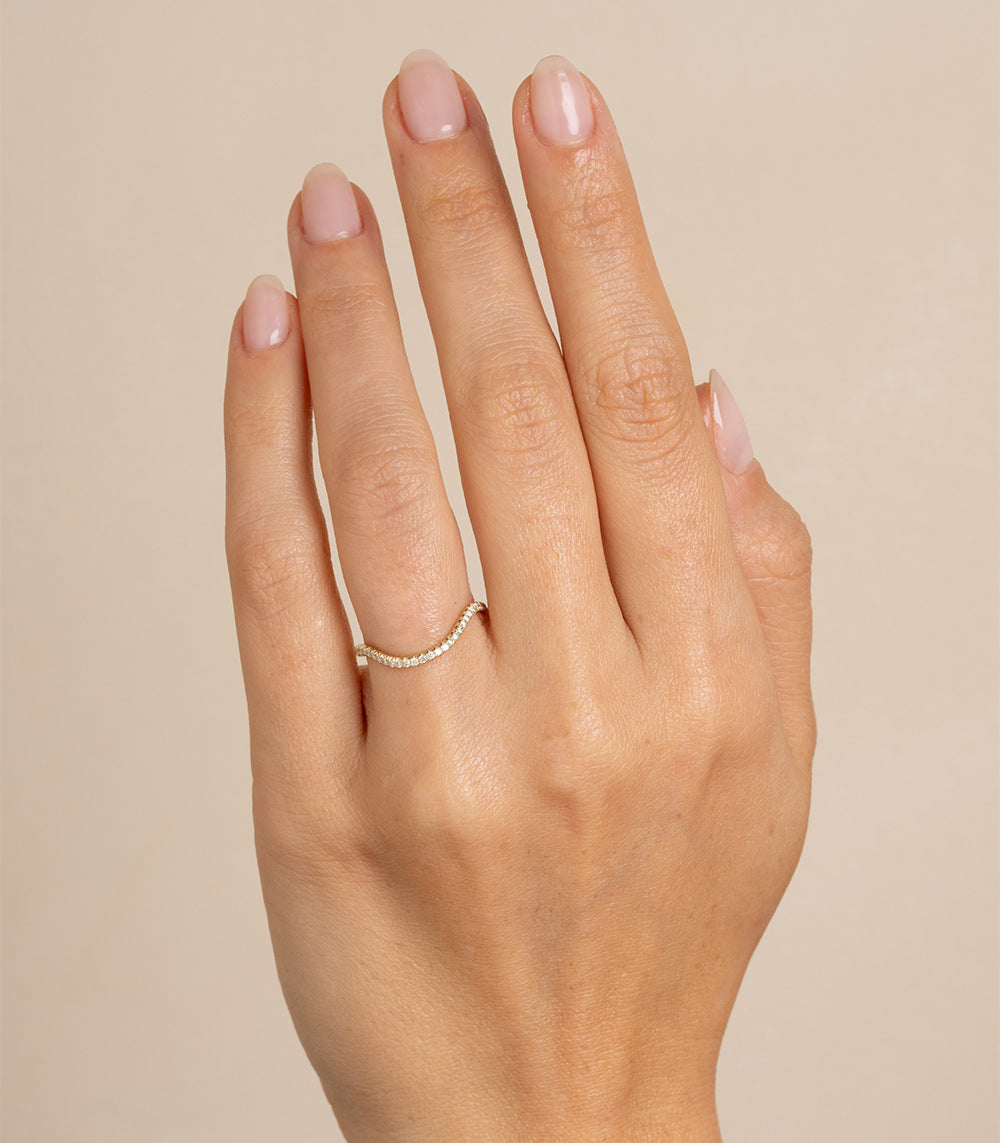 Beau Band by A-R41-Demi ring band in shiny 14K white gold with curved row of small stones