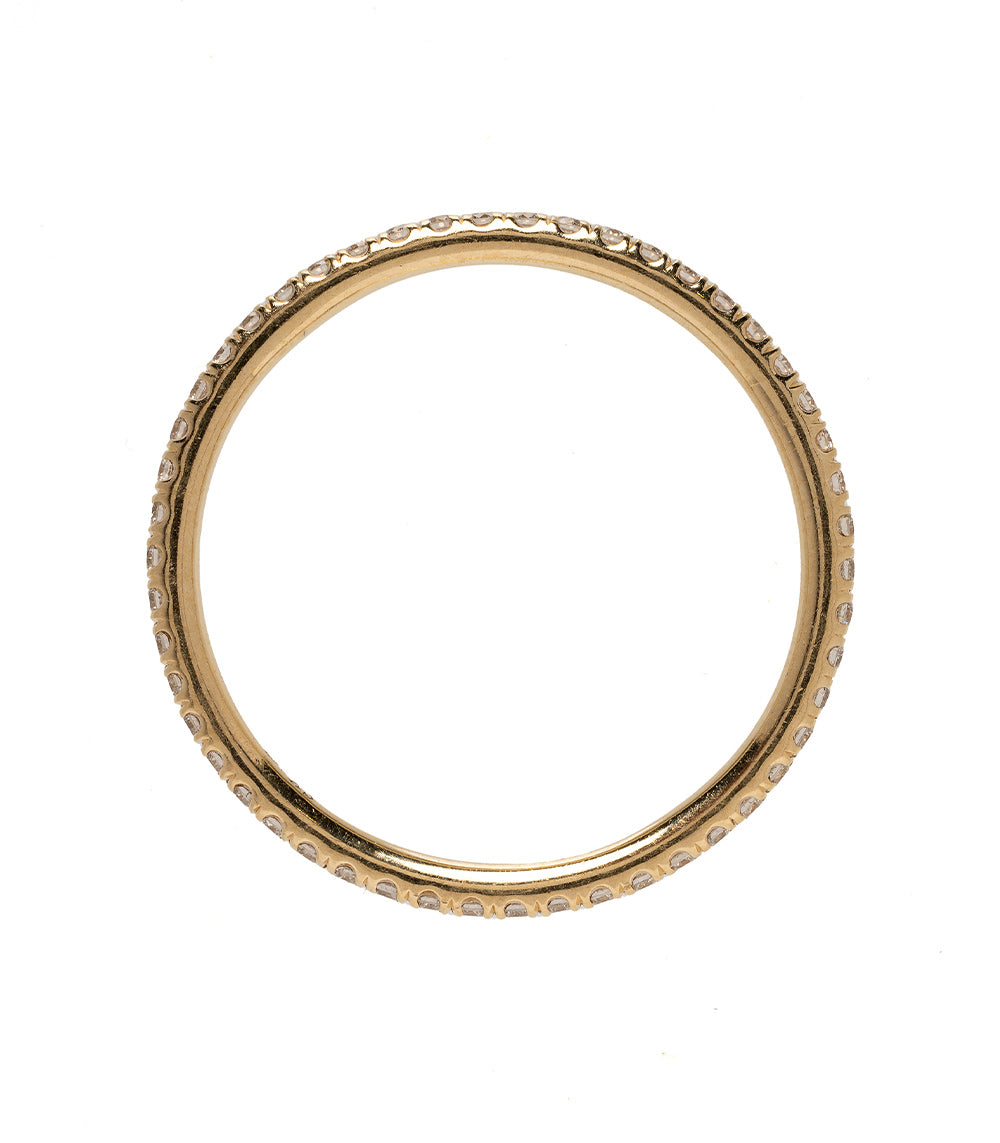 Classic Wire Band by EB-R9 wire band in 14K yellow gold with bead-set stones around the edge