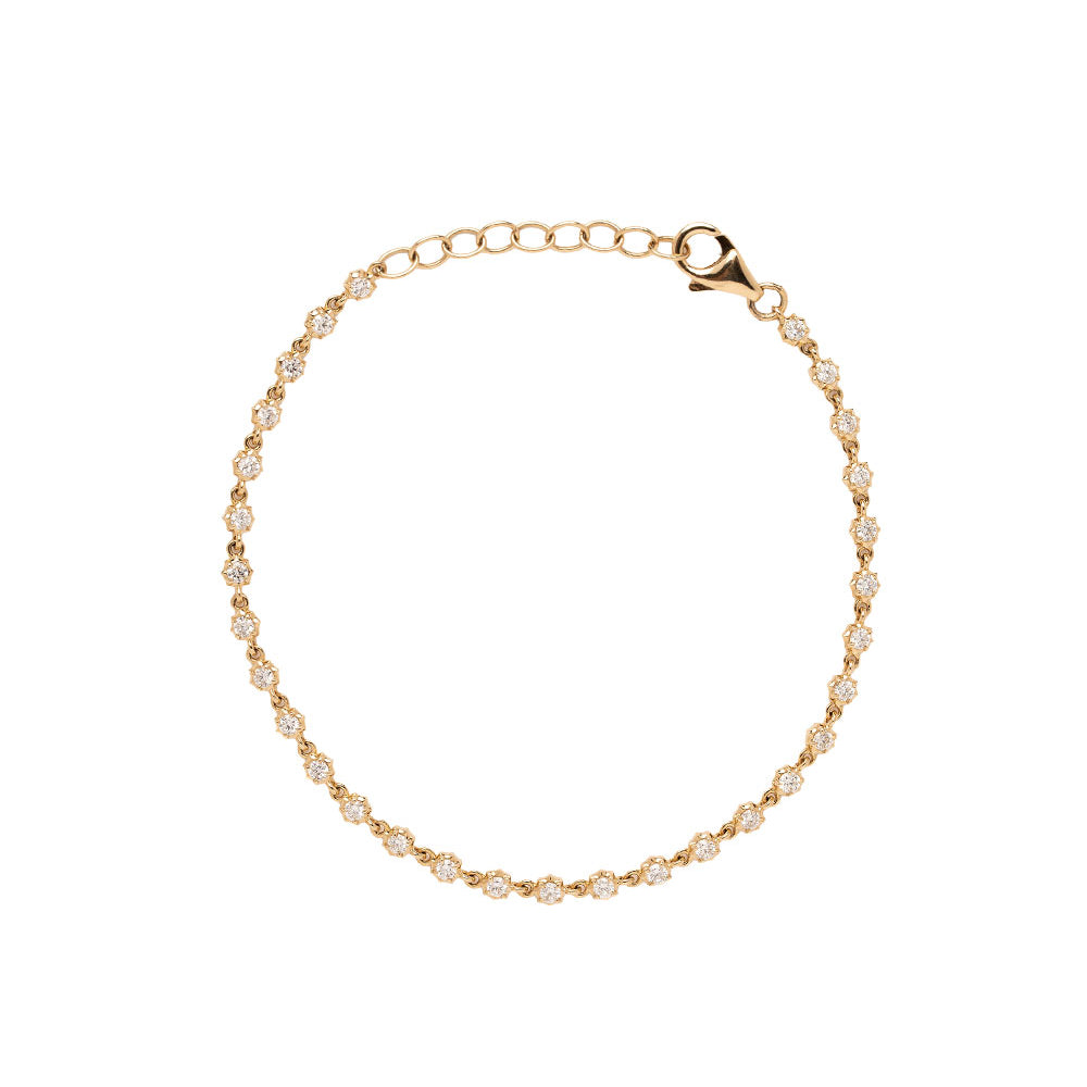The Doheny Sofia Kaman gold tennis bracelet with round pavé stones and a clasp charm