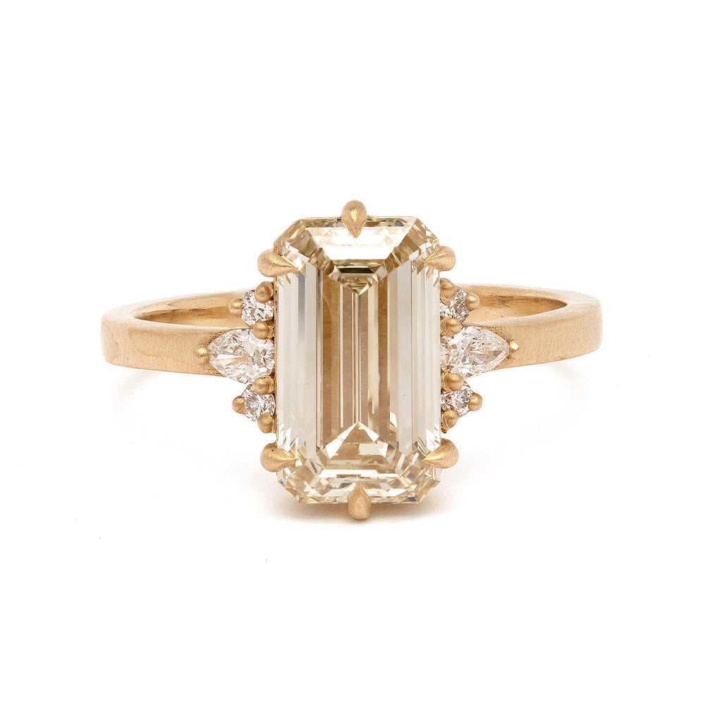 Melina SK-R72-CD-EC-2.53 gold engagement ring in warm yellow gold with emerald-cut center stone and accents