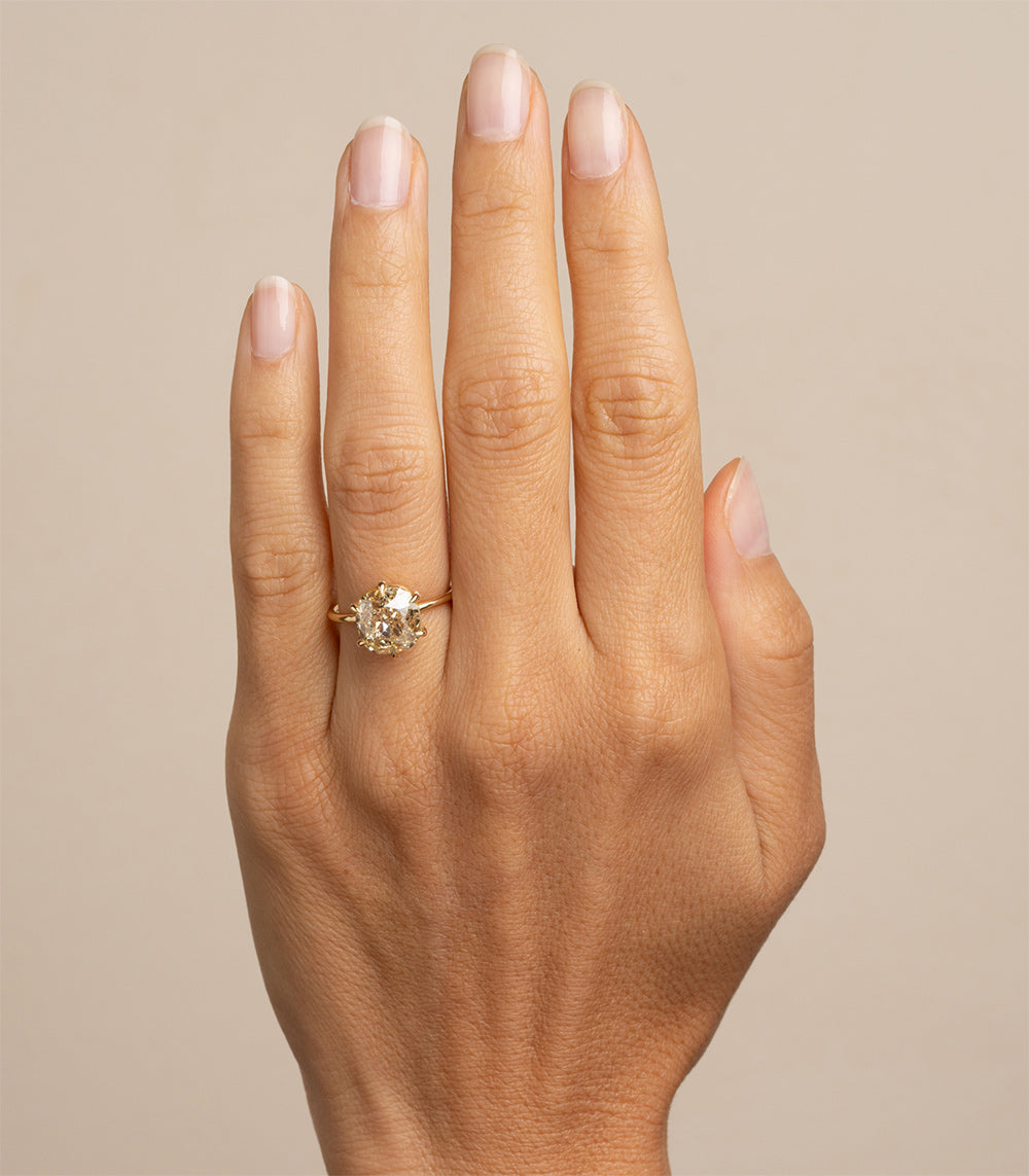 Ella SK-R62-ND-CU-CD-4.62 understated unique engagement ring in gold with a round diamond center
