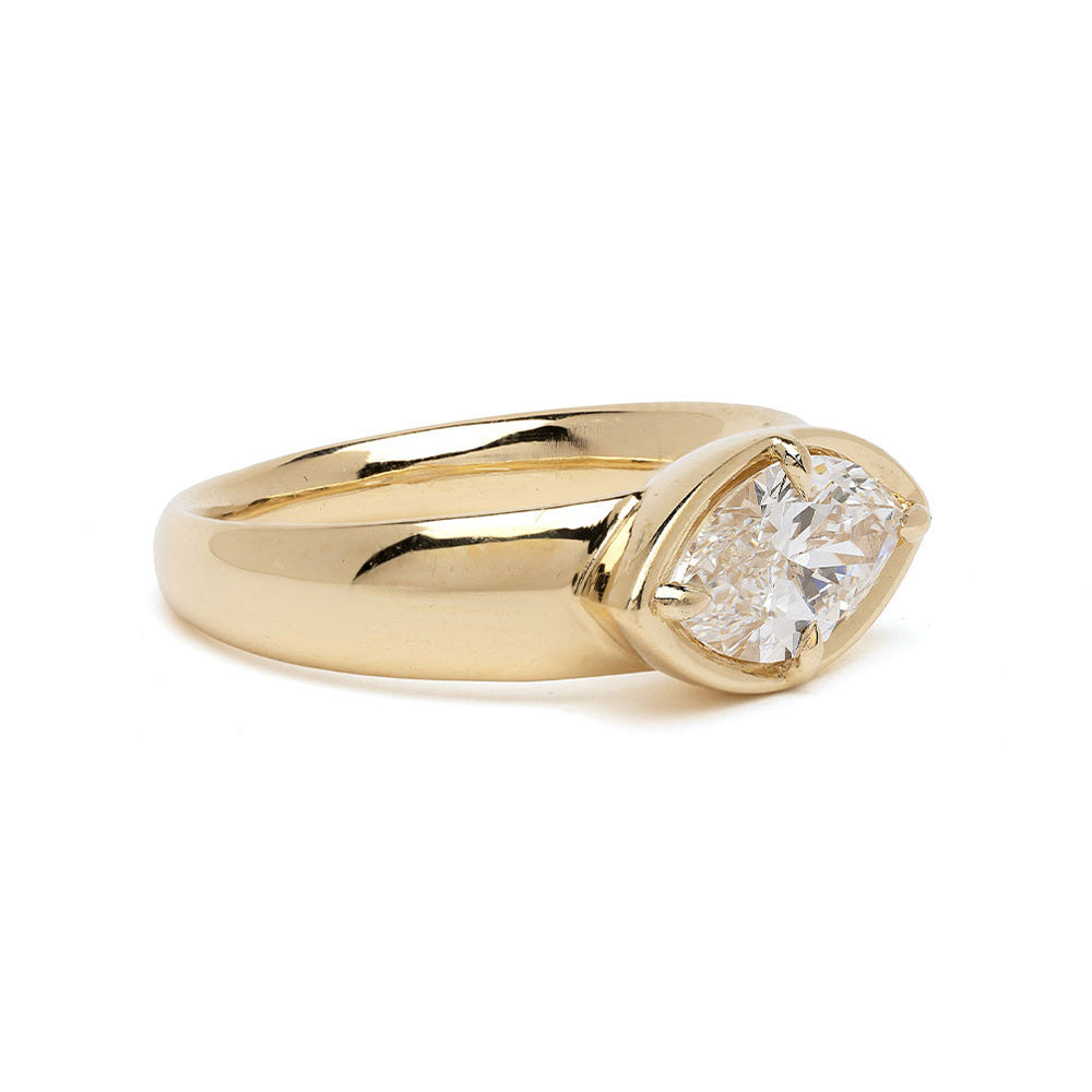 Chloe Pinky Duo by SK-R45-DUO oval gold ring with bezel-set oval diamond center on bright background