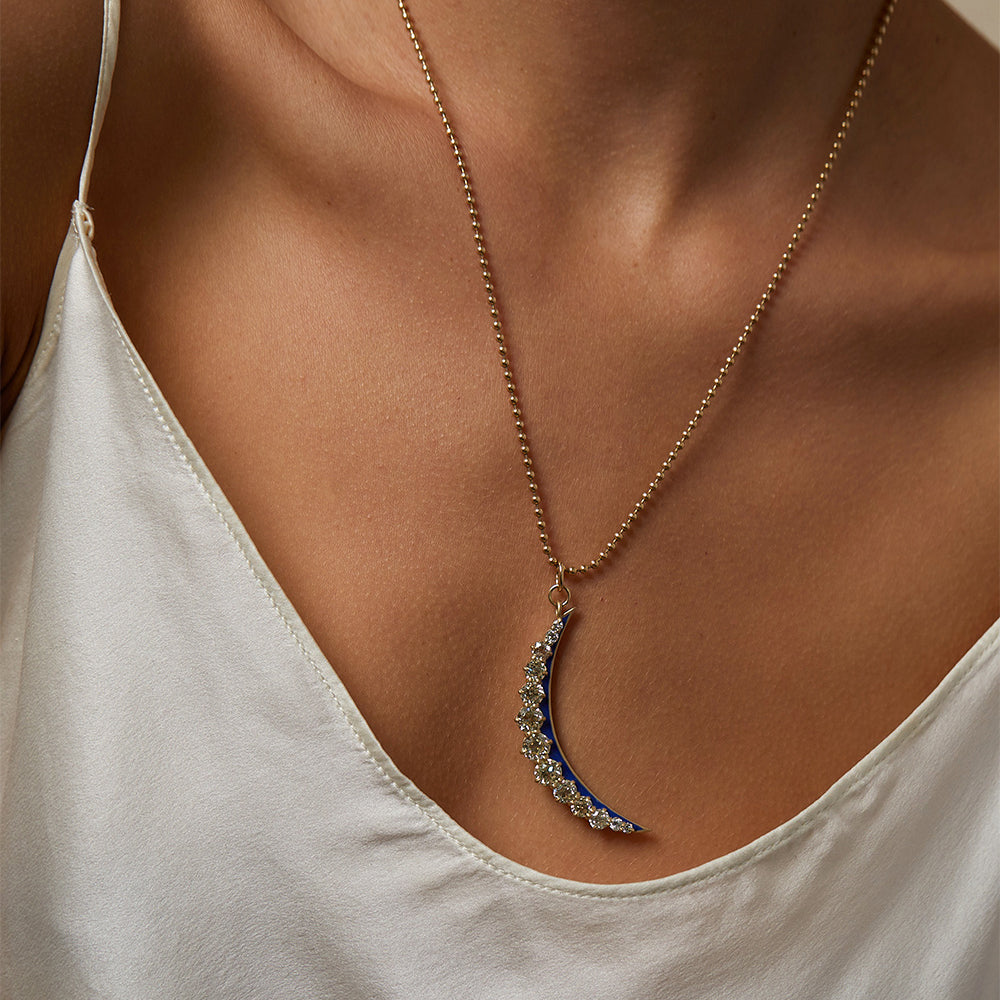 Feminine Divine by SK-P13 crescent moon necklace in gold with pavé stones pendant on model