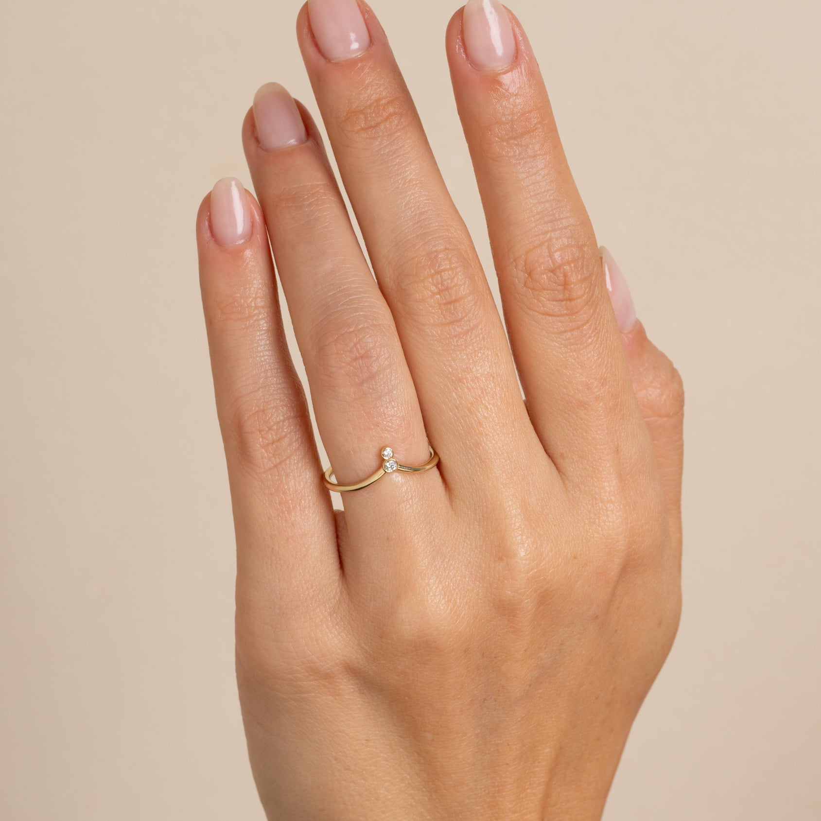 Tiara Bezels Nesting Band AL-R2-D nesting band ring in shiny yellow gold—understated bezel-set diamond