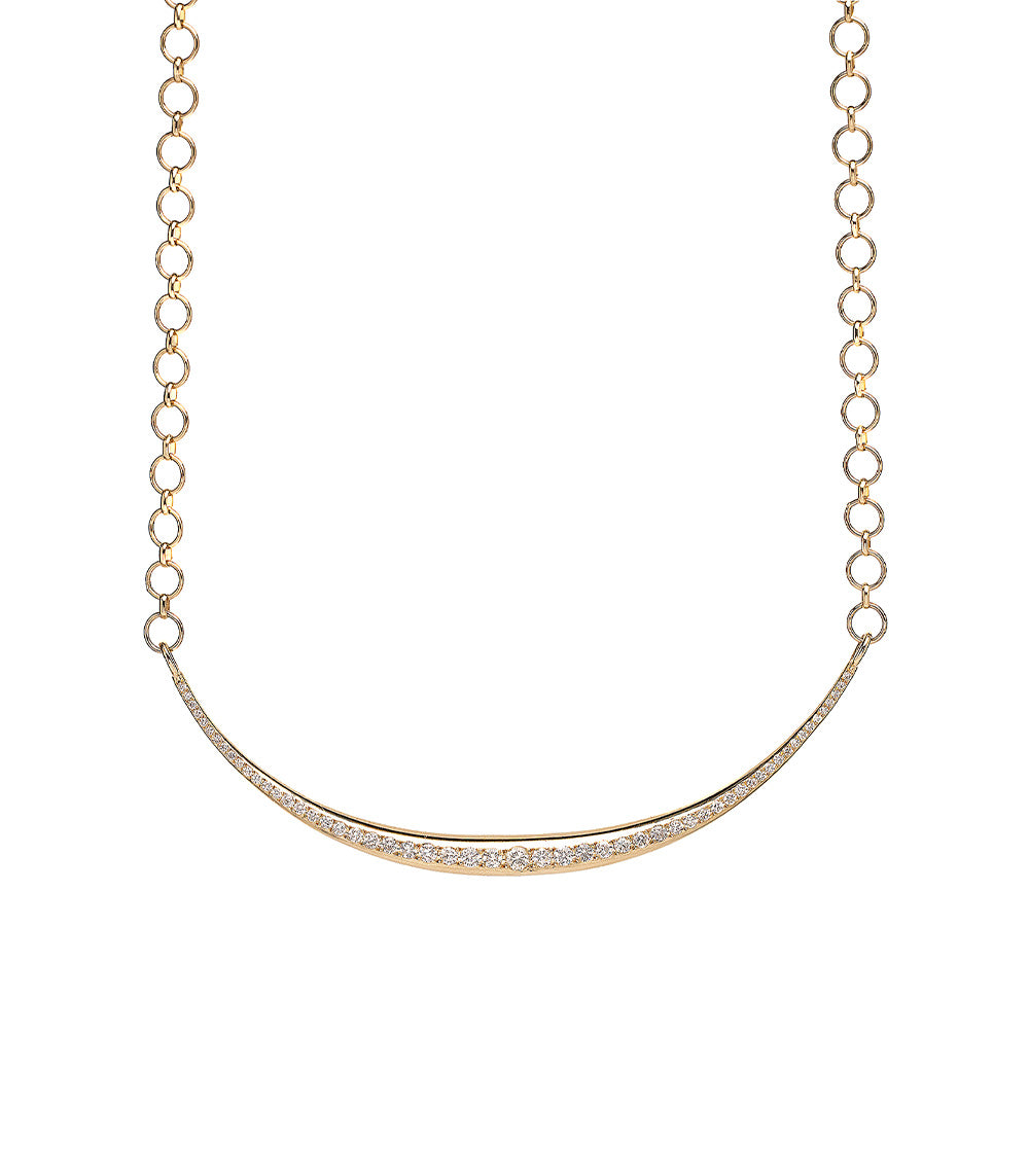The Luna SK-N4 gold necklace with fine pavé stones in a curved bar design against a white background
