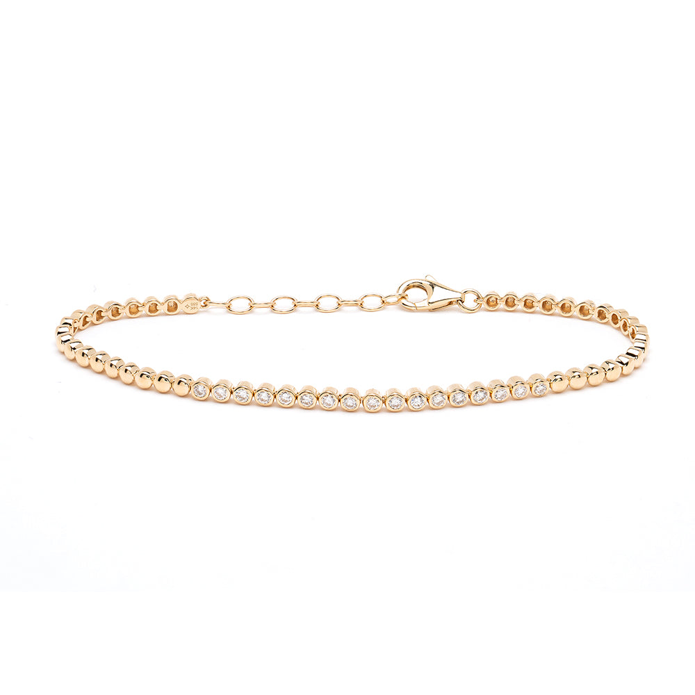 'Bu II CC-DB5 gold bracelet with beaded chain and a row of small clear stones along the center