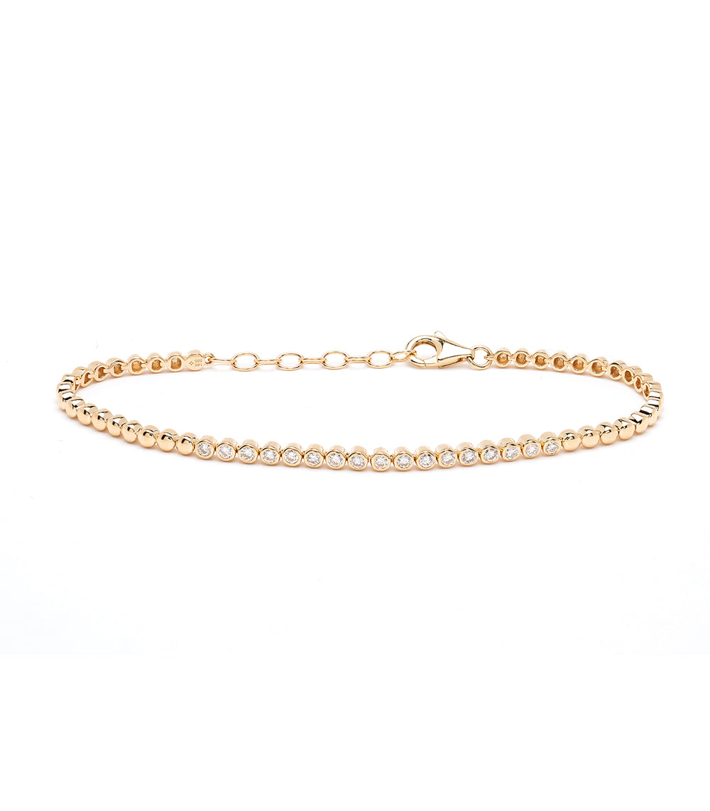'Bu II CC-DB5 gold bracelet with beaded chain and a row of small clear stones along the center