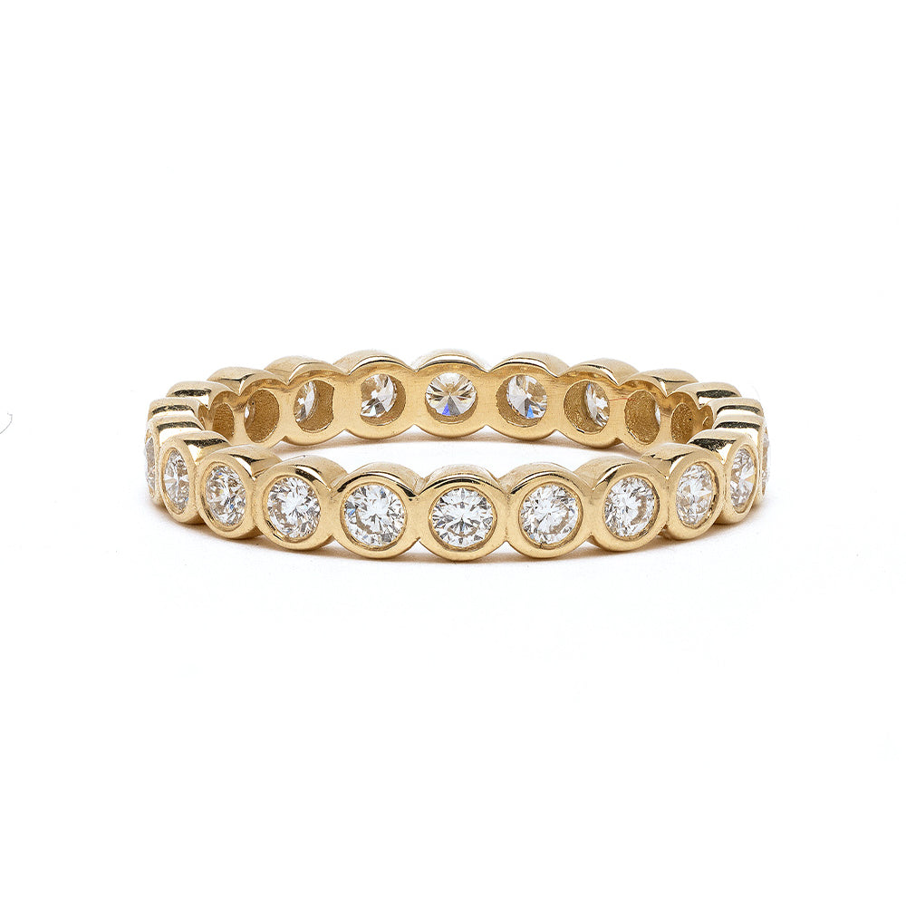Diamond Bezels EB-R17-D diamond band in shiny 14K yellow gold with round bezel-set stones
