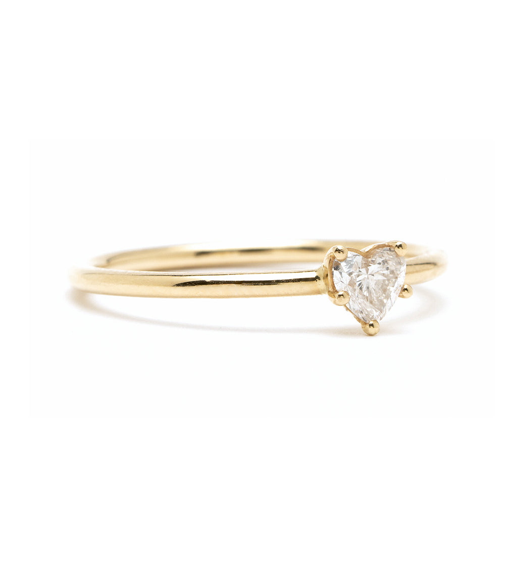 Beloved unique engagement ring by CT-R6 in polished 14K yellow gold, three-prong heart-cut diamond.