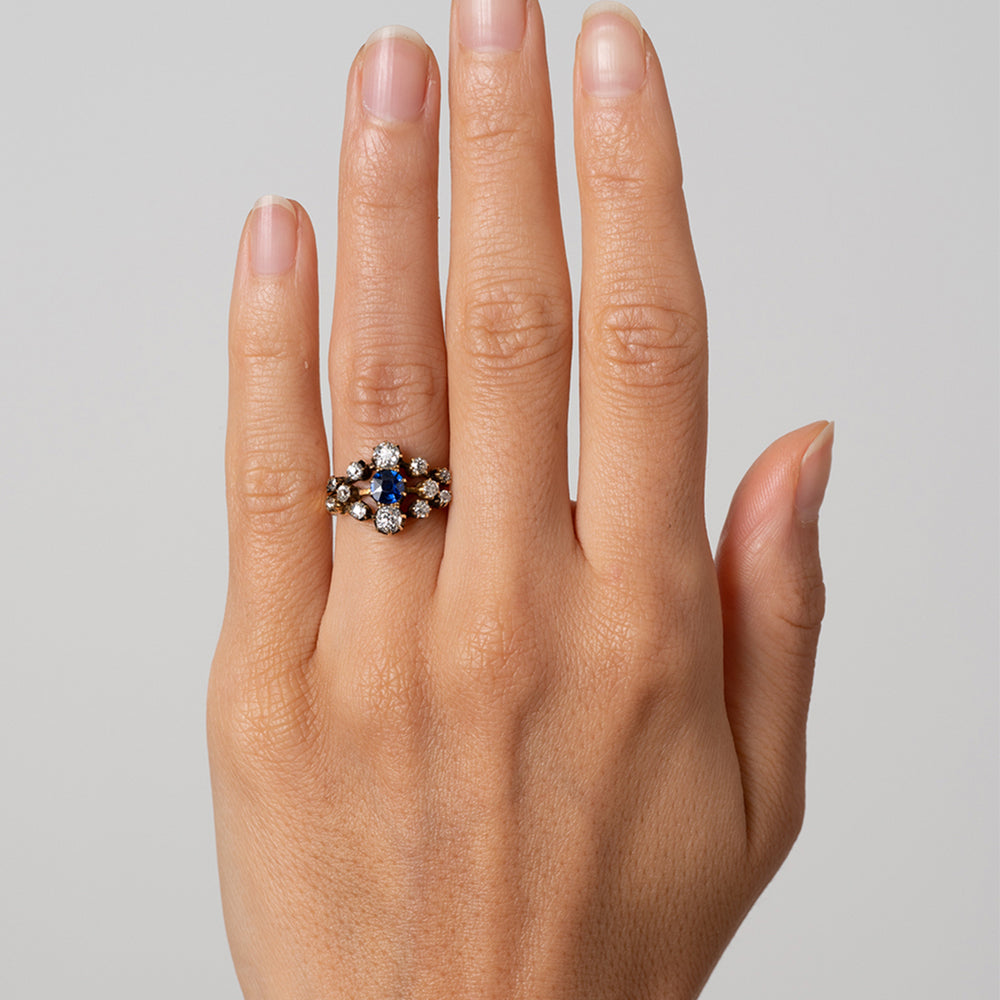 Anastasia VC-R168 engagement ring in silver with blue center stone and round diamond clusters