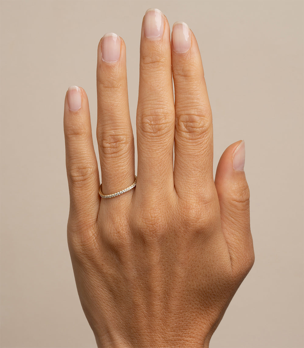 Mini Melt ring by EGB-R18-D in shiny white gold band with small pavé stones on fingers