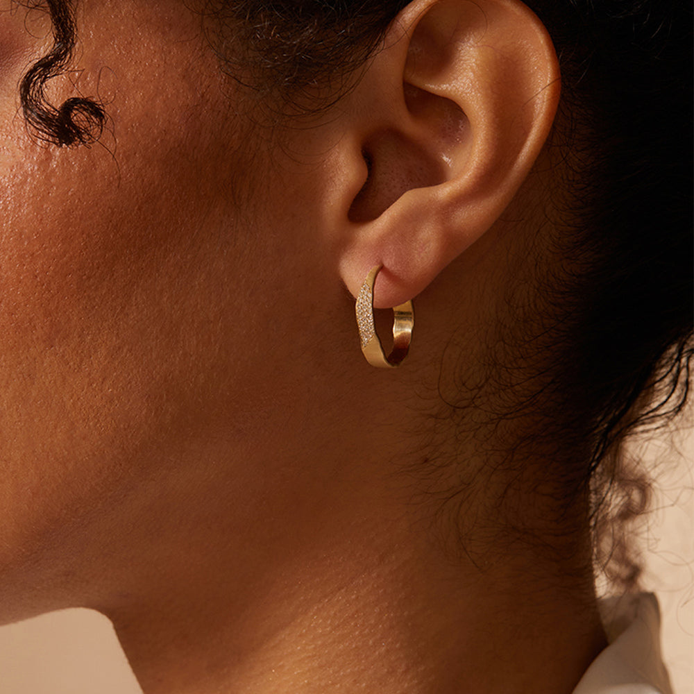 Small Torn Paper Hoops by P-EH3-Patch shiny 14K yellow gold hoop earrings on ear