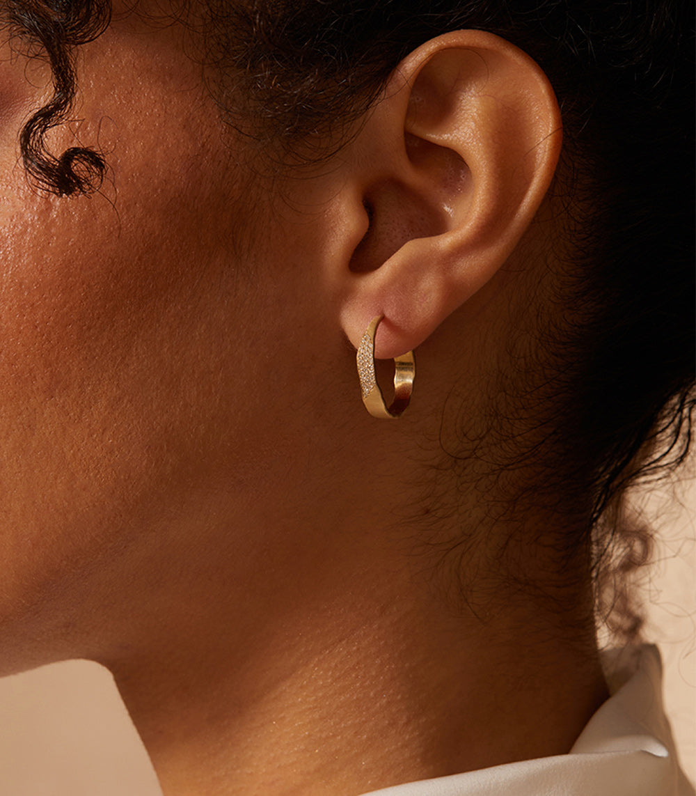 Small Torn Paper Hoops by P-EH3-Patch shiny 14K yellow gold hoop earrings on ear