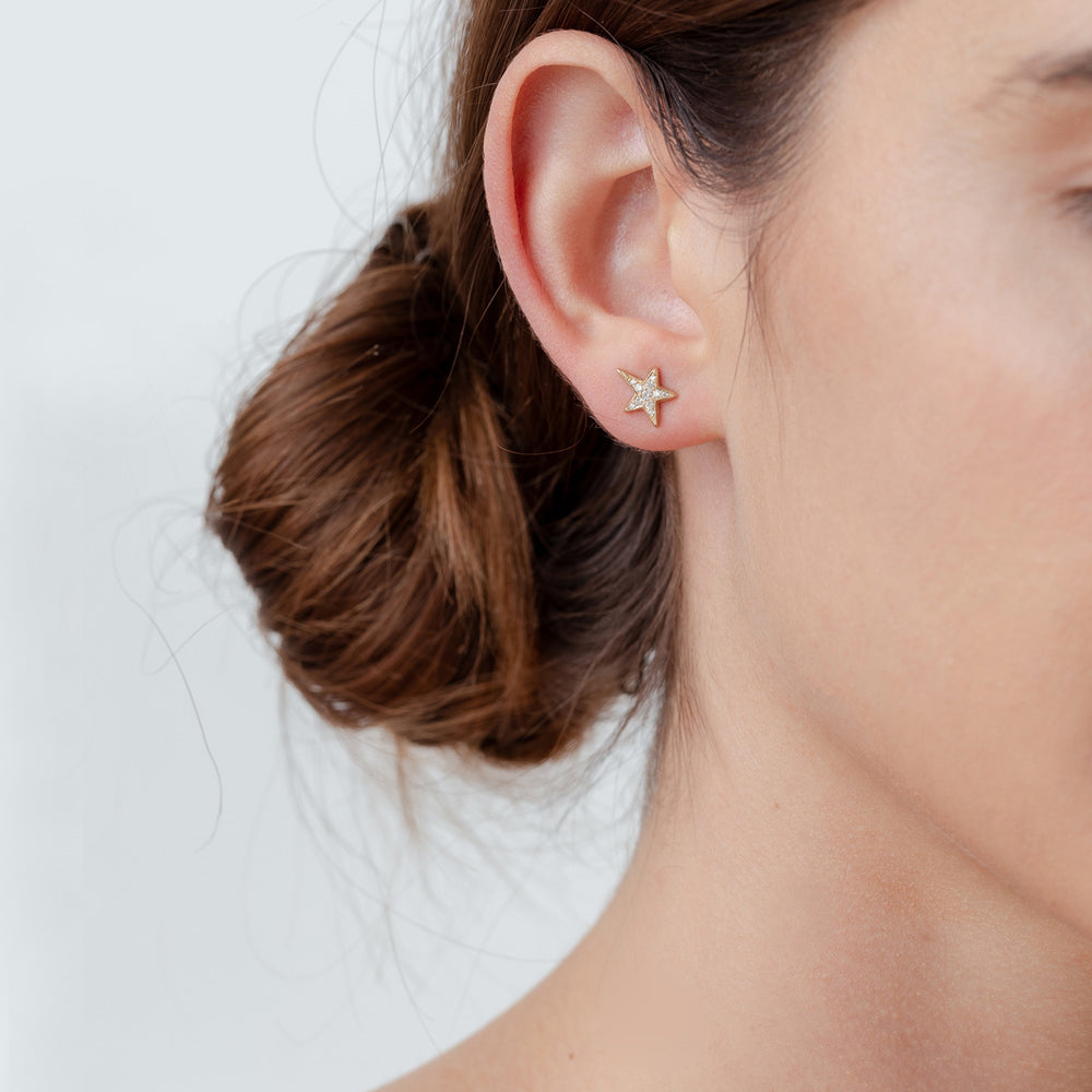 Shooting Star Earrings by ES-E16, 14K yellow gold star stud with a shooting star silhouette.