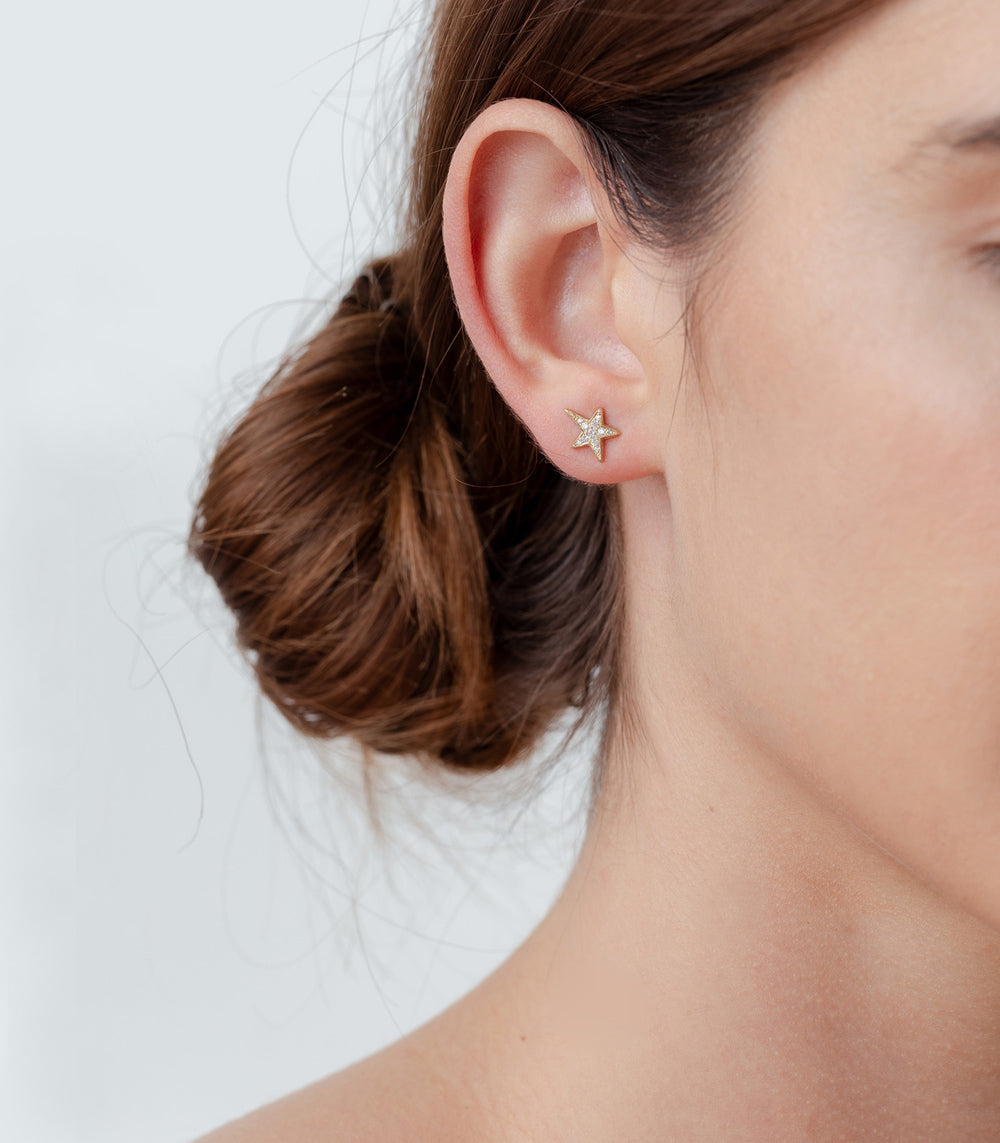 Shooting Star Earrings by ES-E16, 14K yellow gold star stud with a shooting star silhouette.