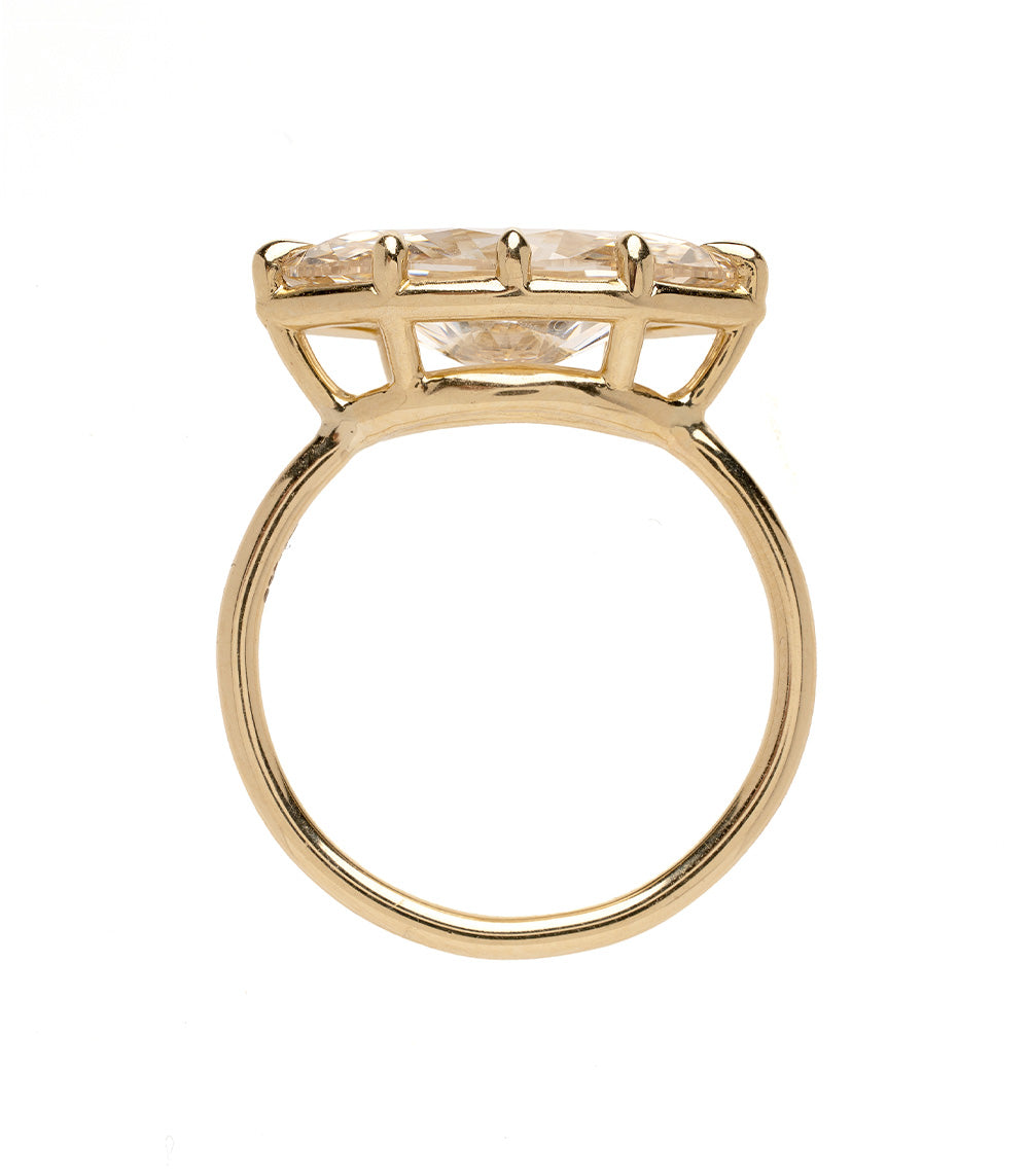 Gigi by Sofia Kaman gold engagement ring with three clear princess-cut stones and polished band