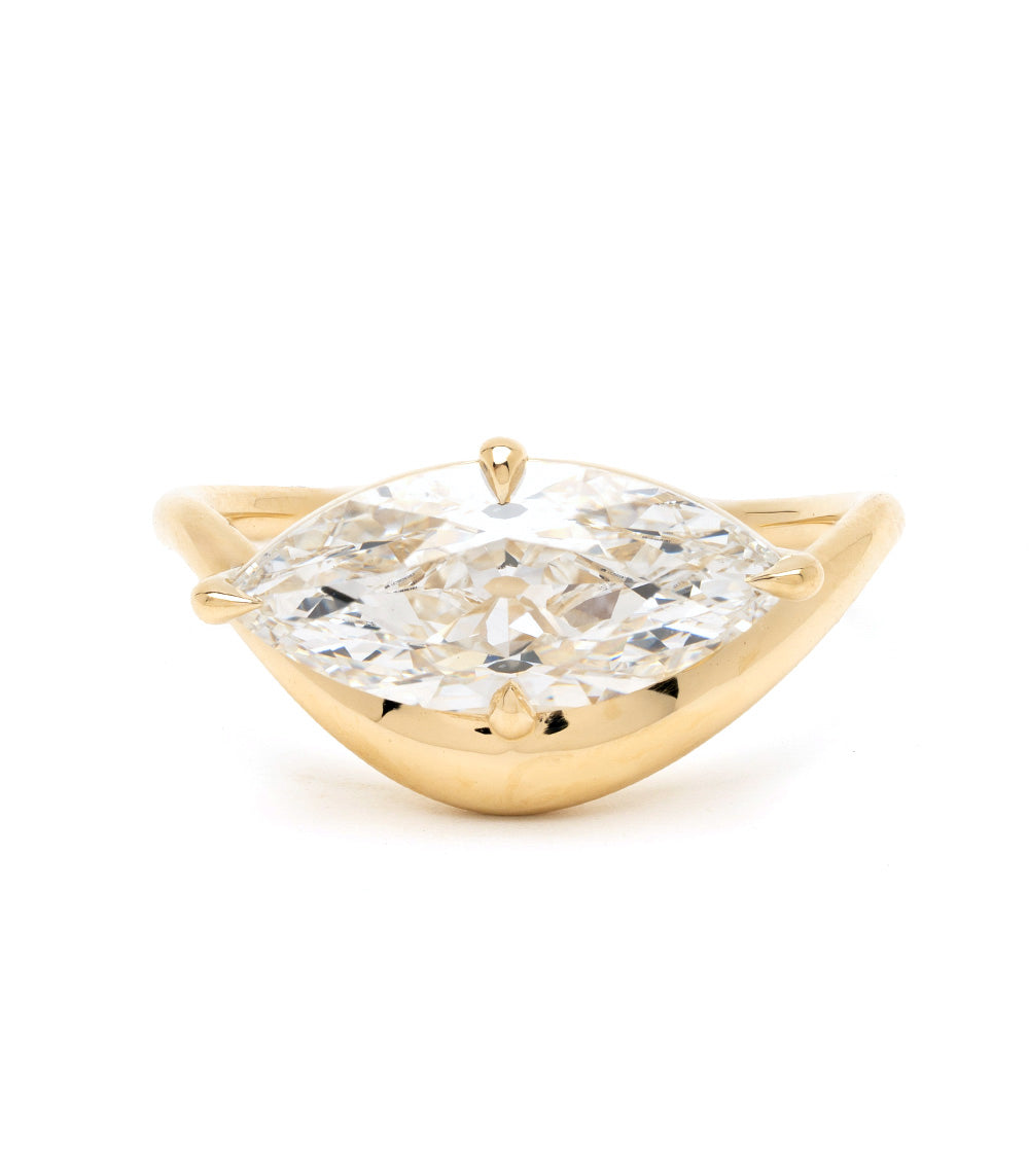 Melt Solitaire ring by Sofia Kaman in yellow gold with a clear solitaire diamond centerpiece—unique engagement ring, understated.