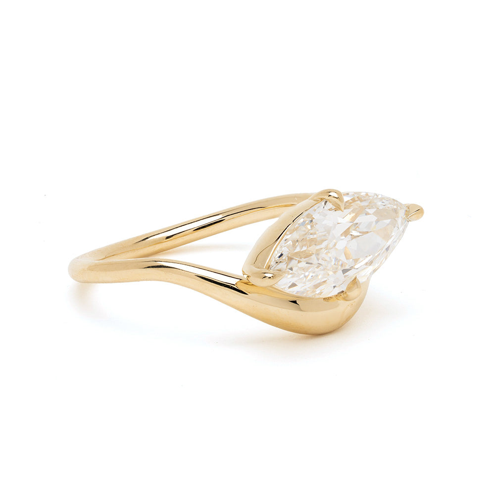 Melt Solitaire by Sofia Kaman unique engagement ring in gold with marquise solitaire diamond stone
