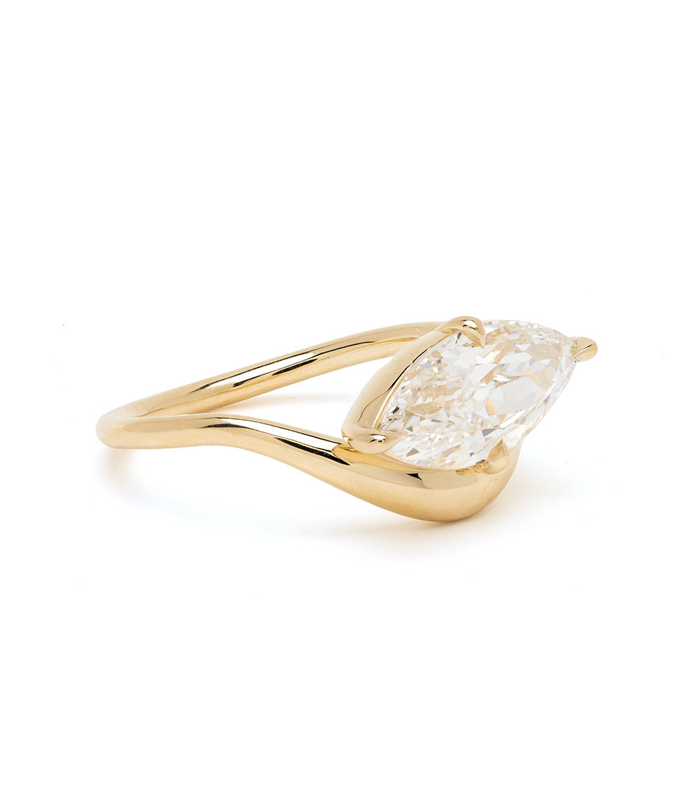 Melt Solitaire by Sofia Kaman unique engagement ring in gold with marquise solitaire diamond stone
