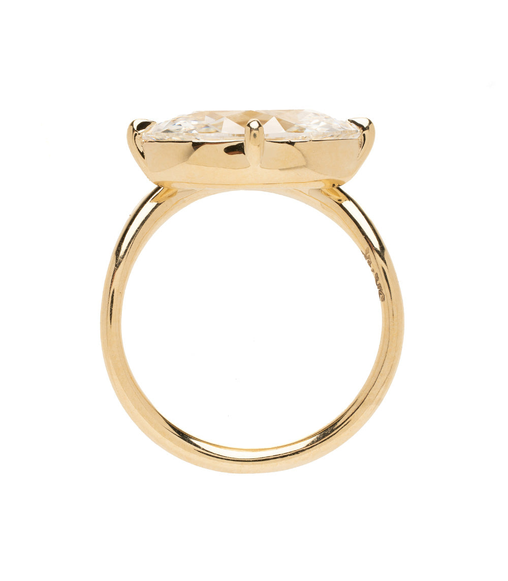 Melt Solitaire by Sofia Kaman unique engagement ring in gold with a clear solitaire stone top