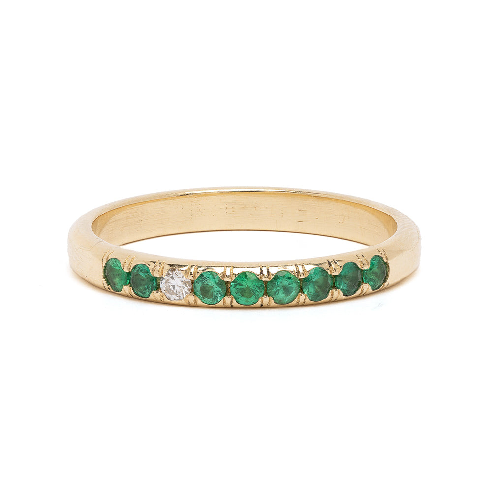 Vintage Inspired Stacking Band LF-R1-ES stacking band in 14K yellow gold with green gemstones and one diamond.