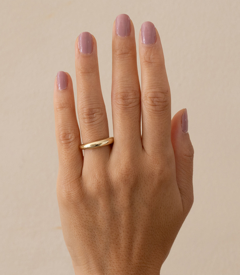 Crescent Band A-R44 ring in 14K yellow gold, shiny curved profile on finger