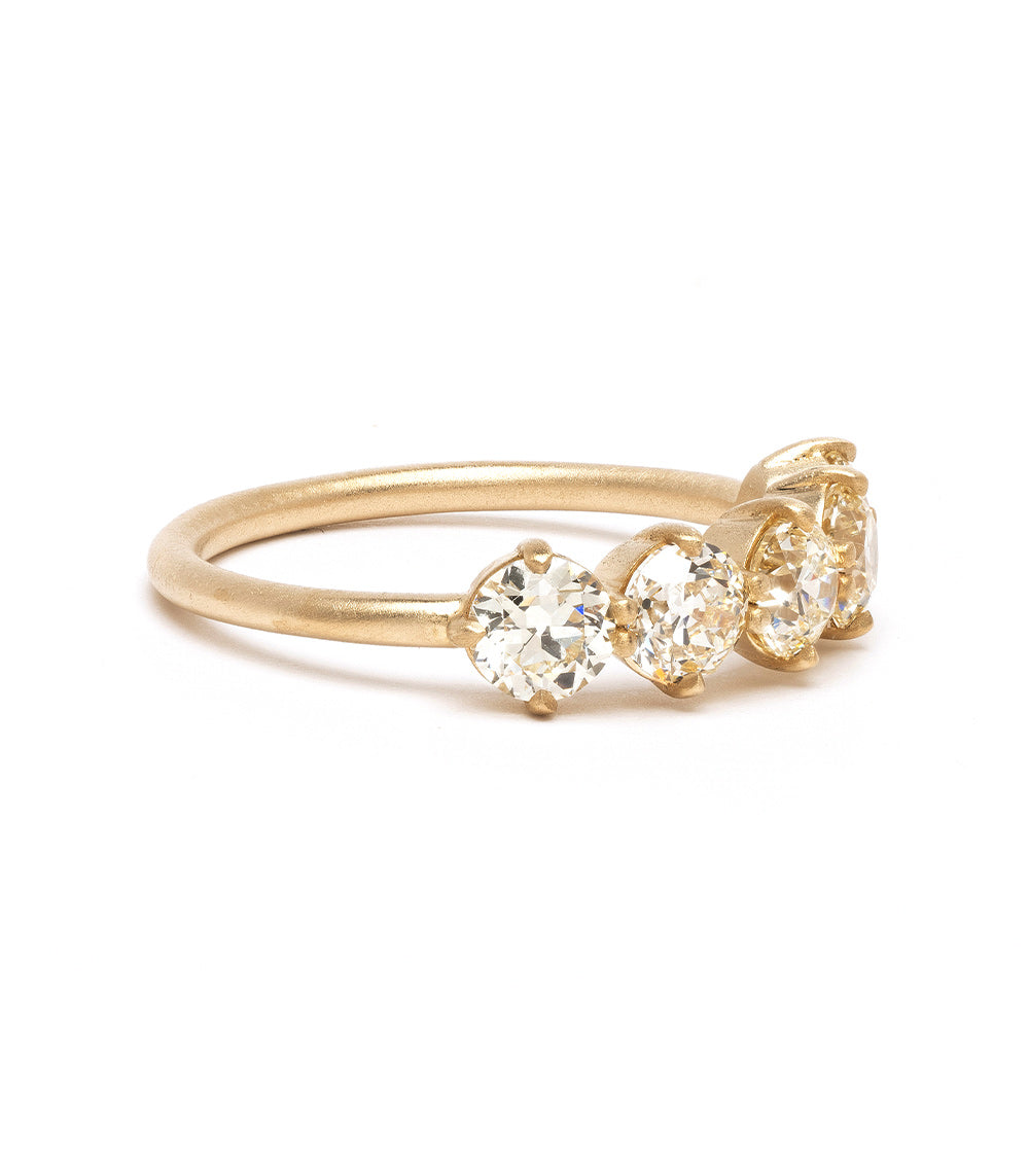 Claudette 5 Stone Band by SK-R68-Band-1.68 gold ring with five sparkling stones in warm light