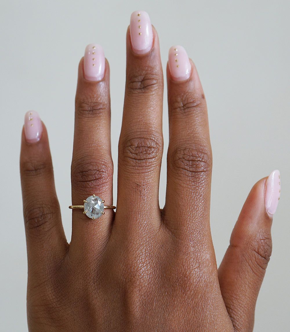 Kate SK-R31-RC-OS-SP unique engagement ring gold band with round solitaire diamond on finger