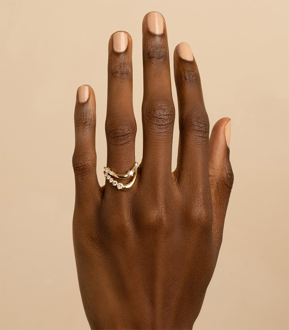Medium Melt Band EGB-R15 ring in 14K yellow gold, shiny curved three-stone design.