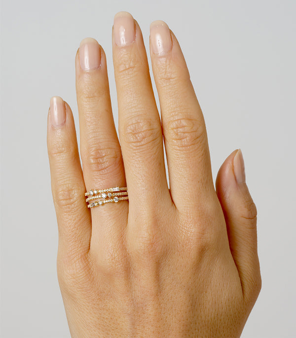 Confetti Band EB-R13 14K yellow gold ring with a confetti-style stone band on a hand