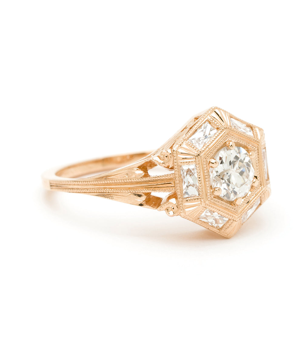 Zelda SK-R54 filigree gold engagement ring with a geometric halo and three faceted stones—warm shine