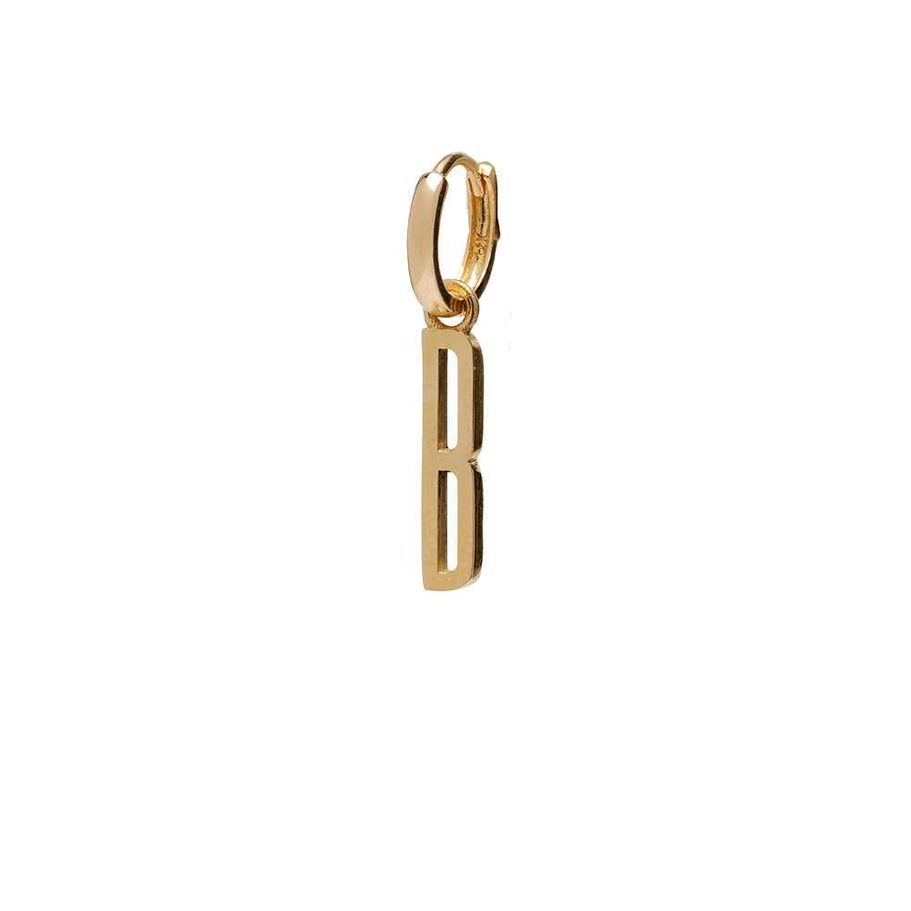 ID HUGGIE NO.1 by ID-E1 gold huggie hoop earrings with vertical cutout charm—minimal style