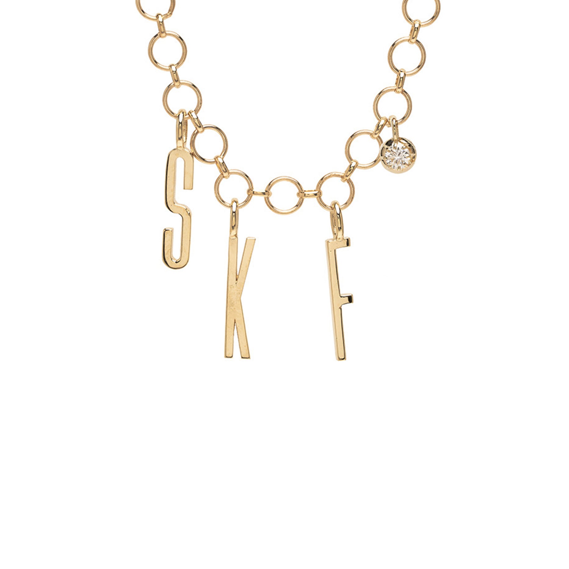 ID NECKLACE NO.9 by ID-N9 gold necklace with linked circles and letter charms, plus small round stone charm