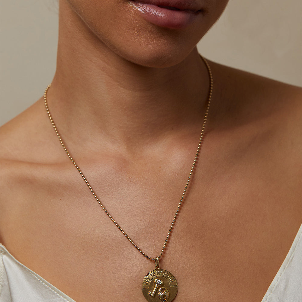 Key to my Heart Charm VC-P15 gold charm necklace with round key heart pendant and small clear stone