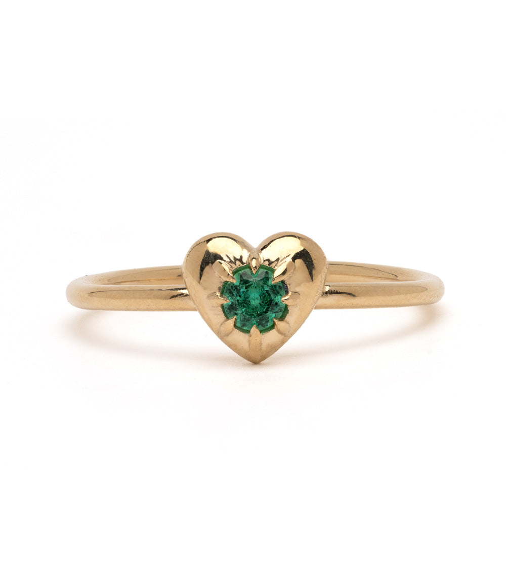 ID RING NO.2 by ID-R2 14K yellow gold heart ring with green gemstone center, close-up.