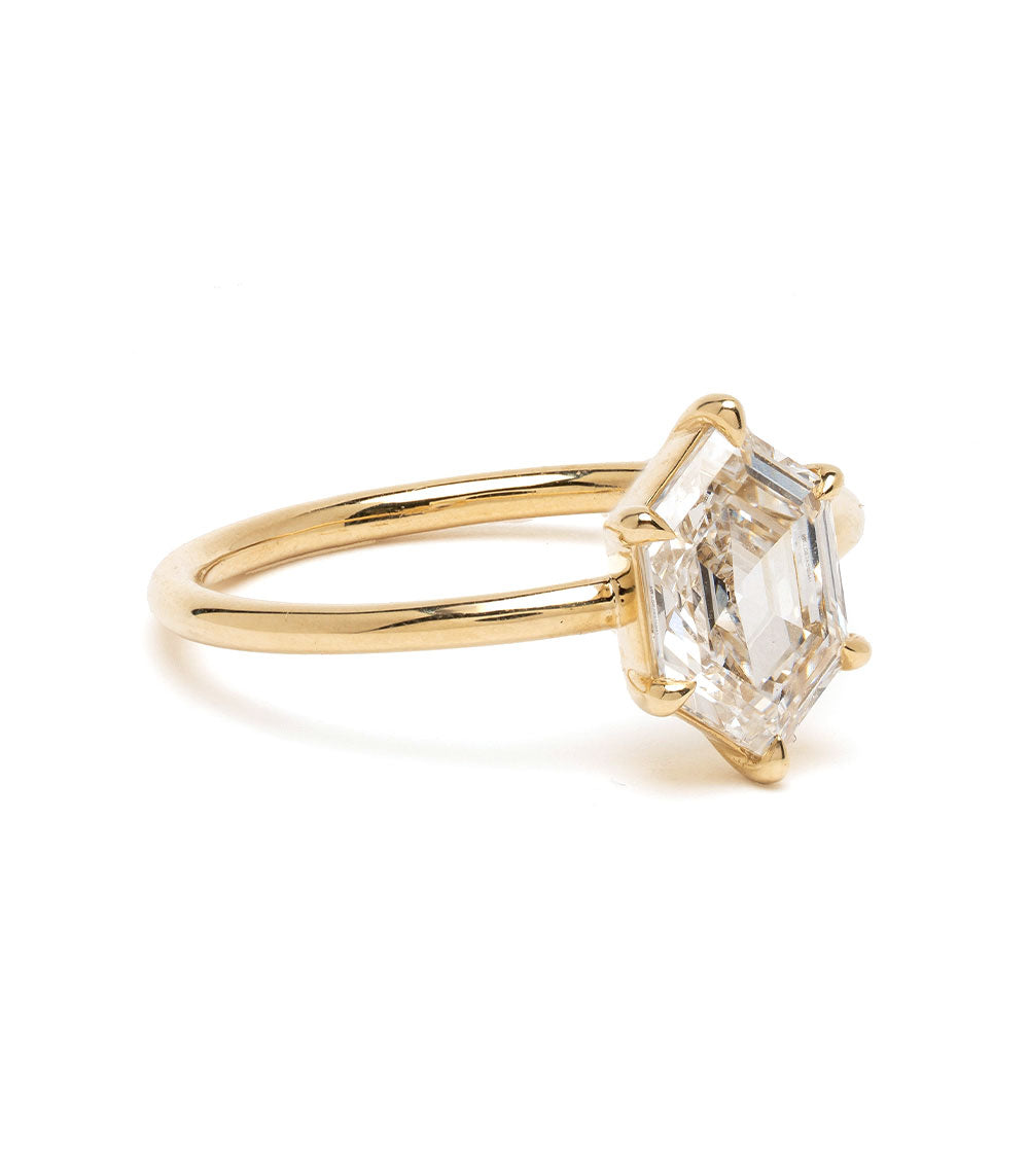 Kate SK-R31-LGD-NS-SC-HEX-1.52 unique engagement ring in gold with a clear emerald-cut stone