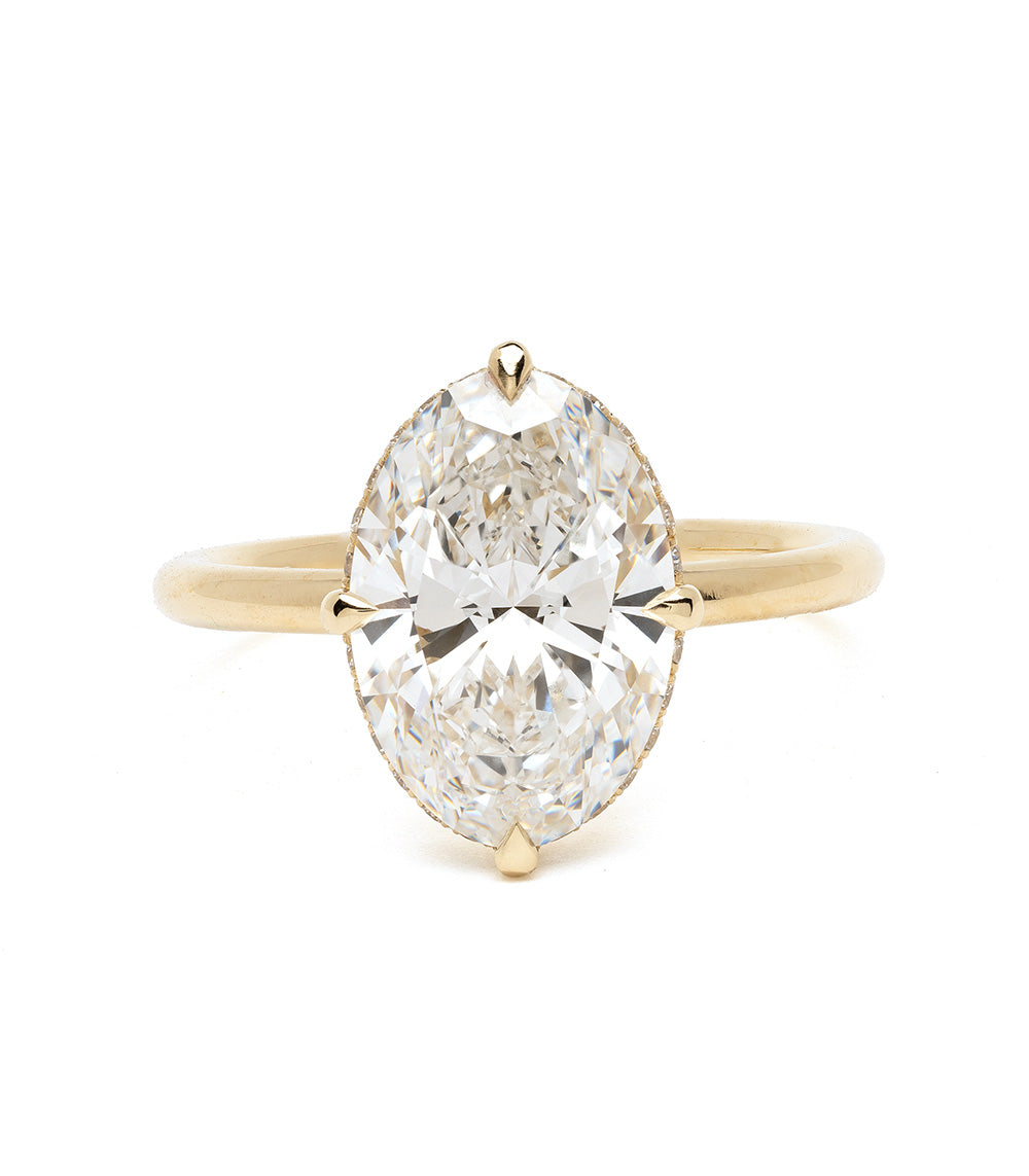 Annika by Sofia Kaman oval engagement ring in yellow gold with a large center diamond on white background