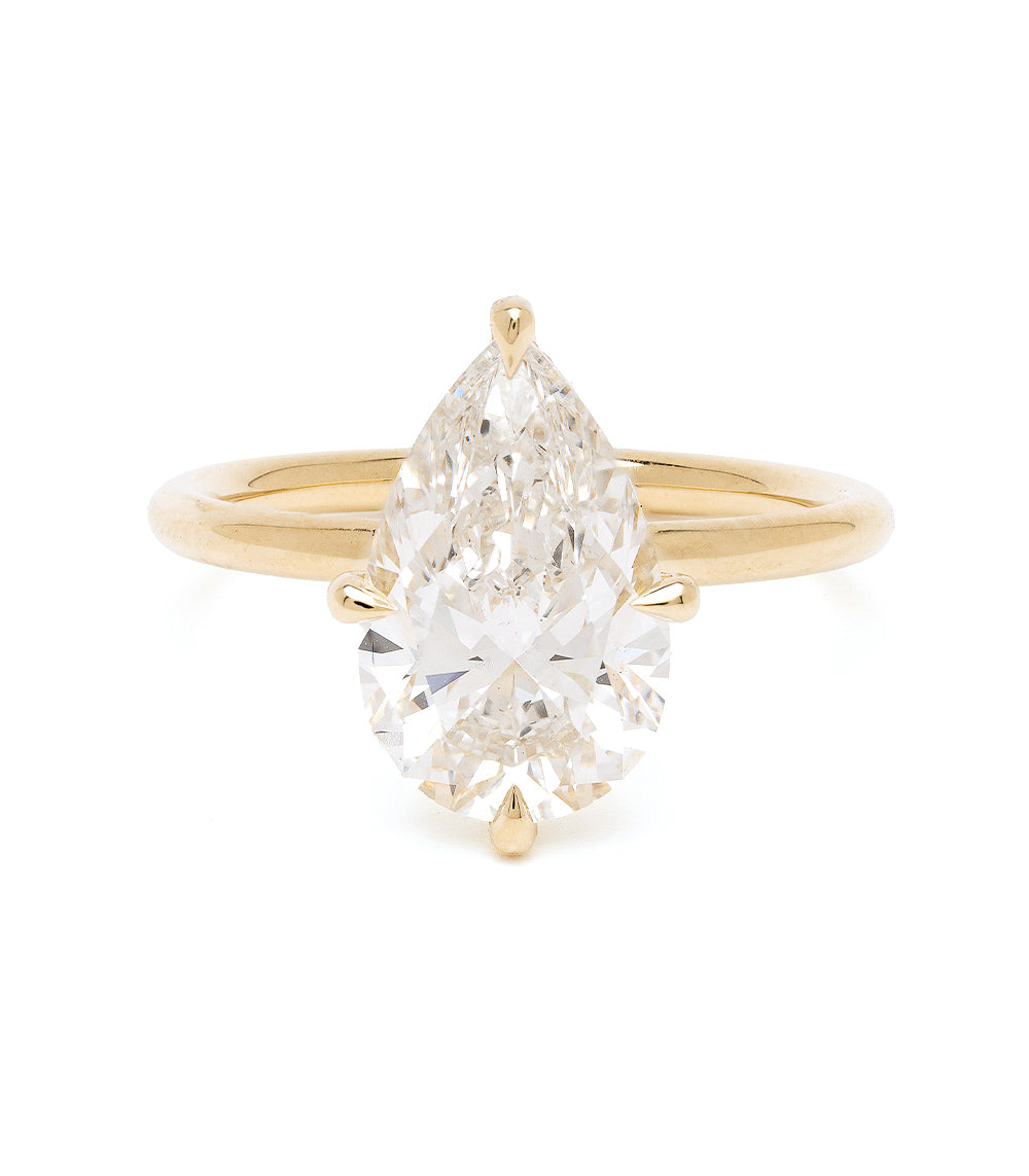 Billie Sofia Kaman engagement ring in yellow gold with a unique engagement ring oval diamond center