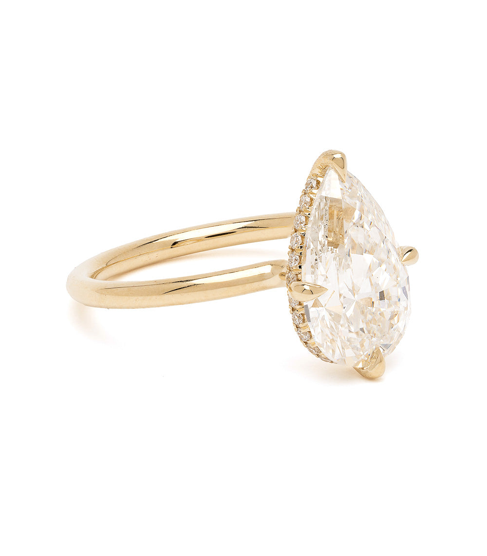 Billie by Sofia Kaman engagement ring in yellow gold with clear diamond-like oval centerpiece and halo