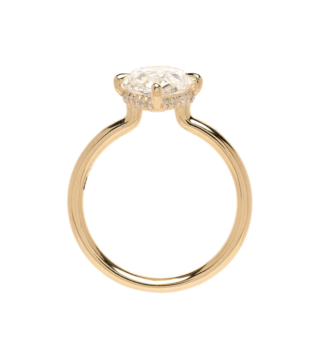 Billie Sofia Kaman unique engagement ring in yellow gold with round-cut diamond halo