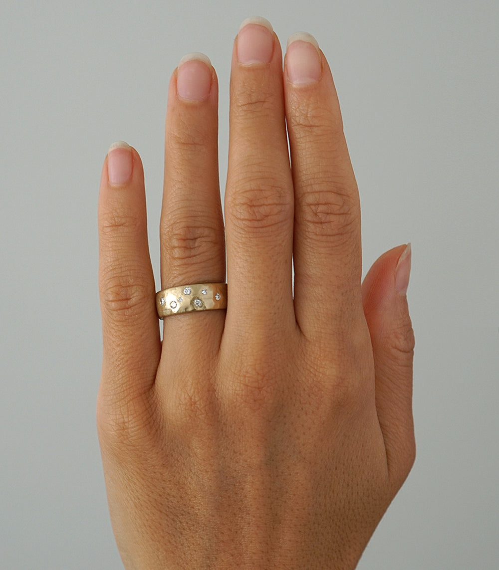 Call Me a Dreamer GN-R2 ring in shiny gold with small round clear stones on the band