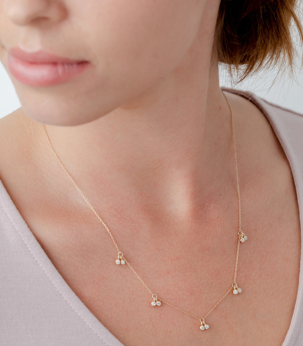 Cherries Necklace by R-N16 in 14K yellow gold with shiny chain and small cherry charms with sparkle