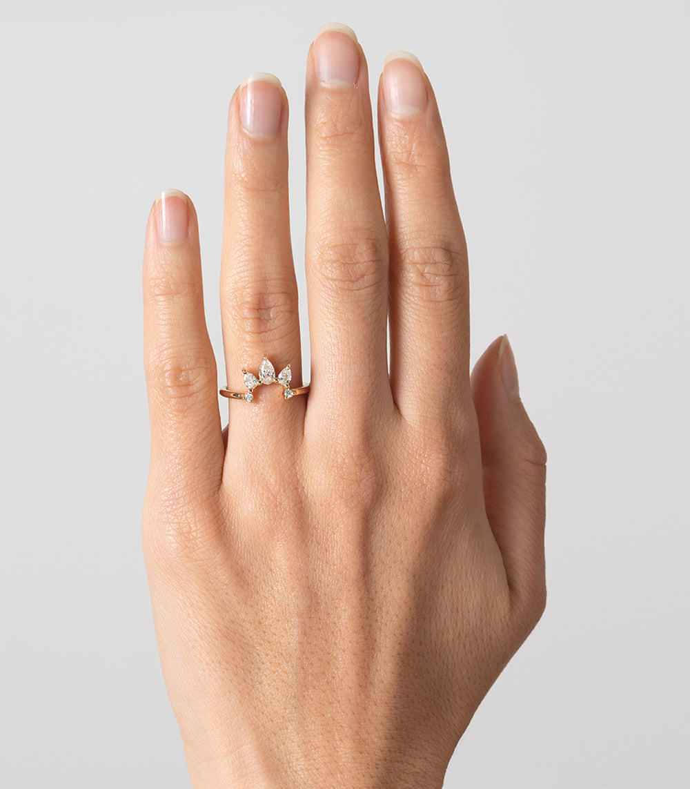 Sunrise Nesting Band AL-R15 shiny band ring with small diamond cluster stones on a hand