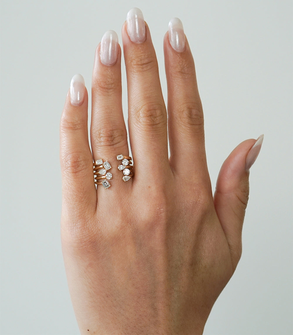 Lunetta A-R38-EC ring in 14K yellow gold with shiny multi-stone setting on hand