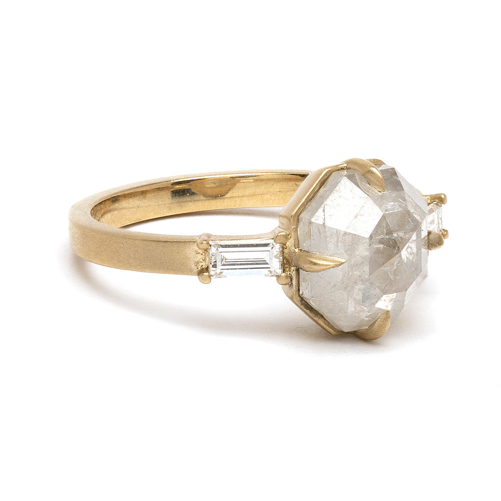 Stardust SK-R58-OC-SP gold engagement ring with faceted clear center stone, understated halo setting