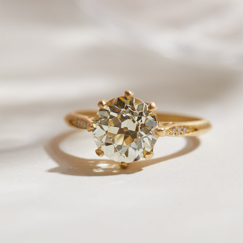 Evangeline gold SK-R92-OEC engagement ring with round diamond solitaire in warm yellow metal