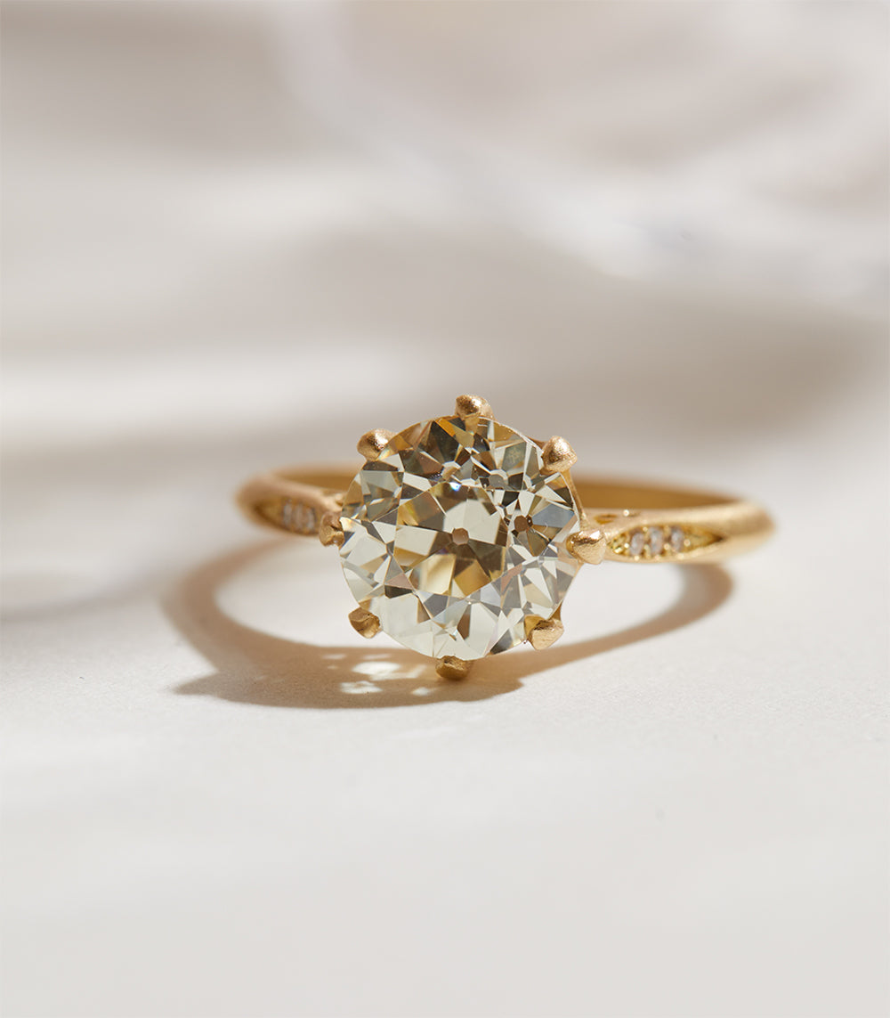 Evangeline gold SK-R92-OEC engagement ring with round diamond solitaire in warm yellow metal