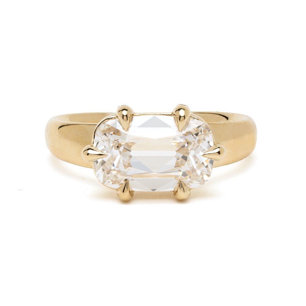 Ella Sofia Kaman engagement ring in yellow gold with a cushion-cut solitaire center stone