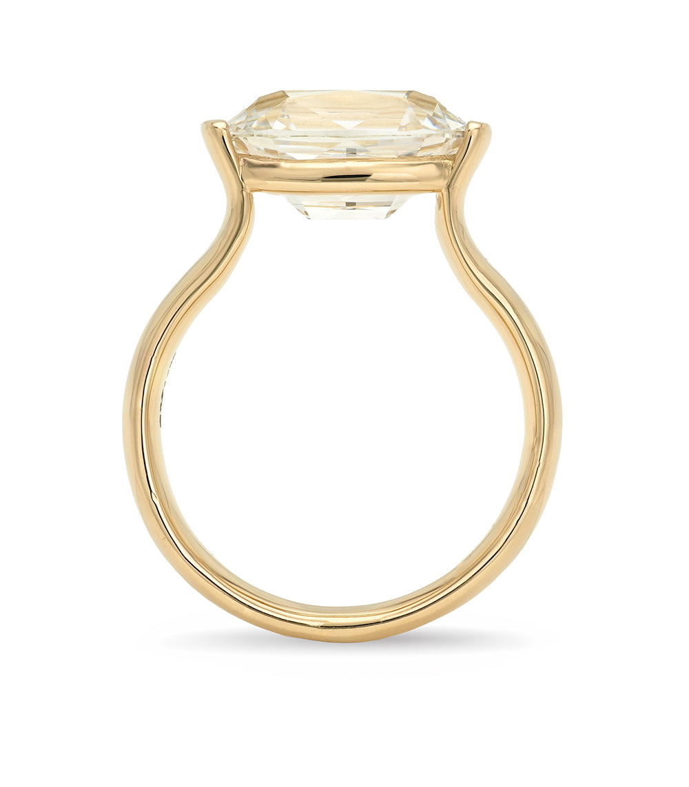 Bardot Sofia Kaman unique engagement ring in gold with an understated square-cut solitaire diamond